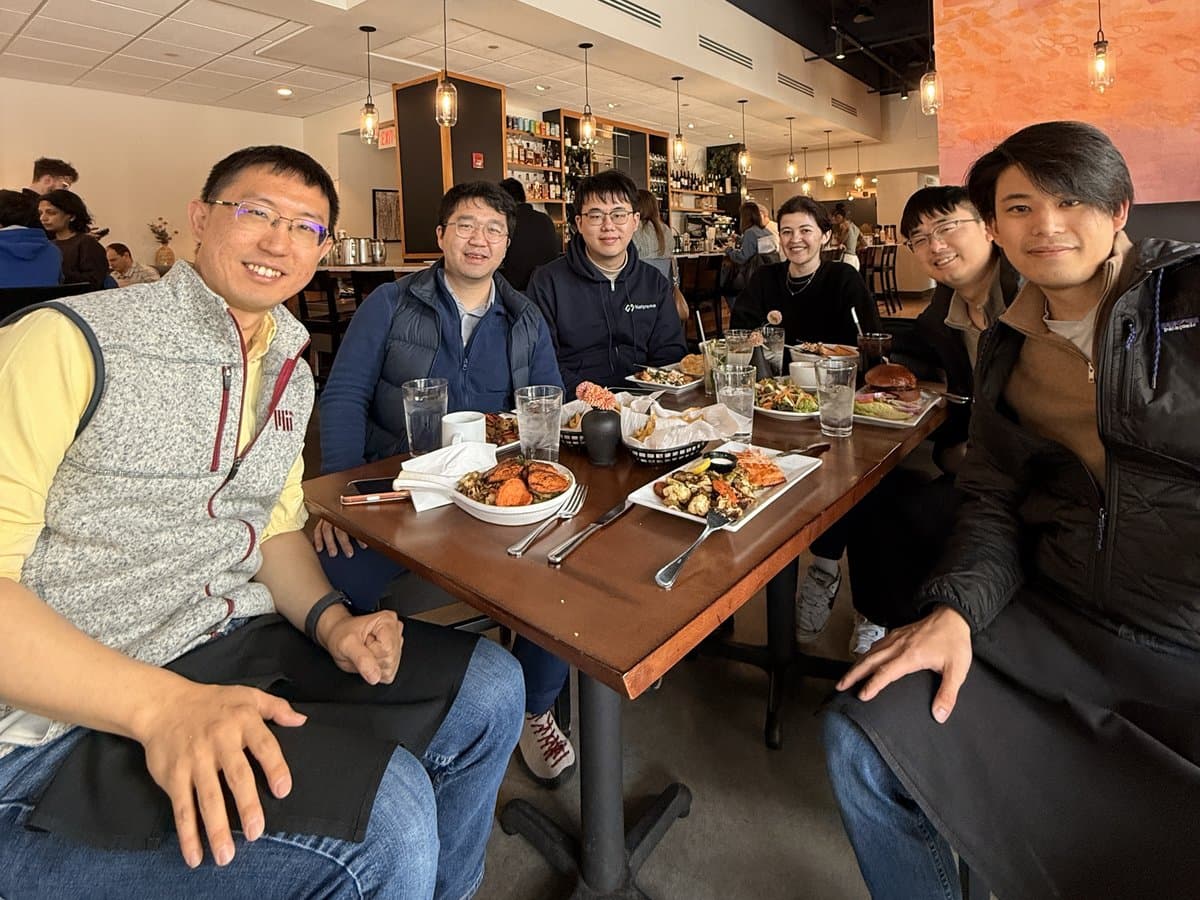 Six of the Netpreme team over lunch around a restaurant table
