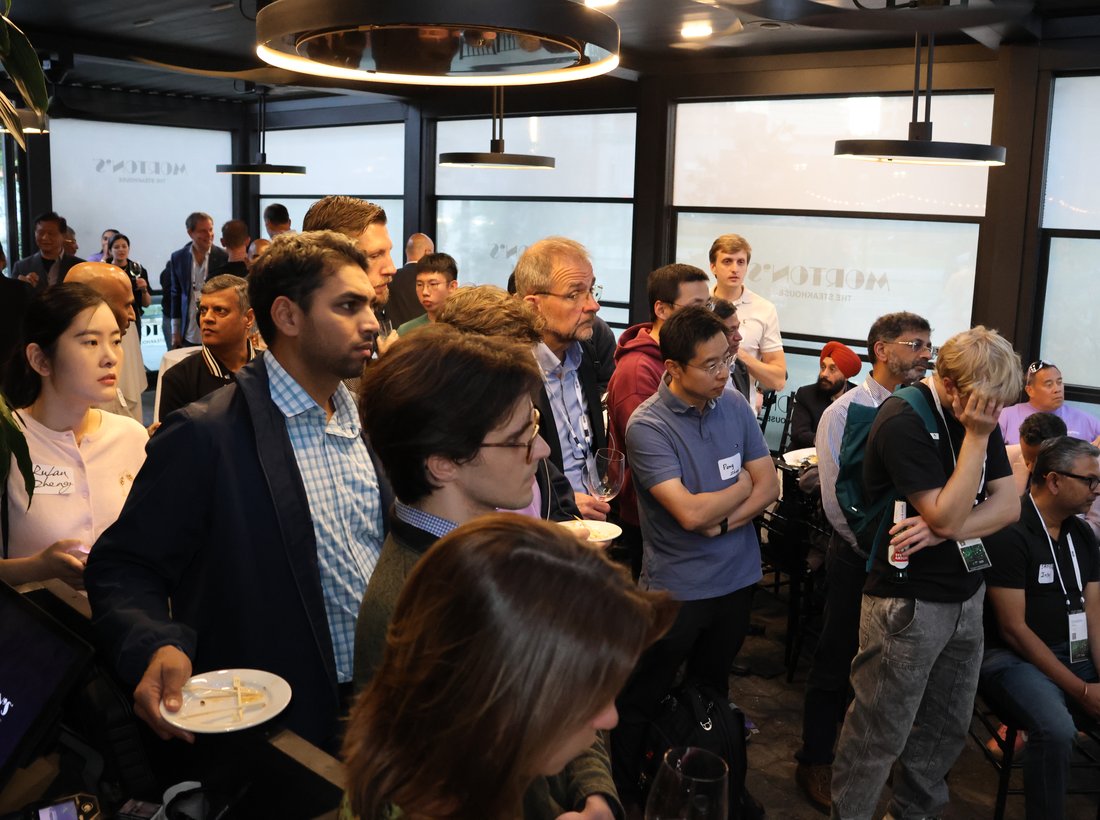 Attendees listening to the panel at Netpreme’s OCP happy hour.